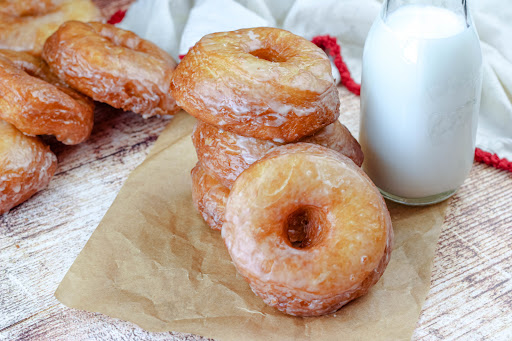 A stack of Old-Fashioned Yeast Doughnuts.