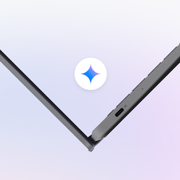 Close-up of a Chromebook keyboard with a battery full icon next to it
