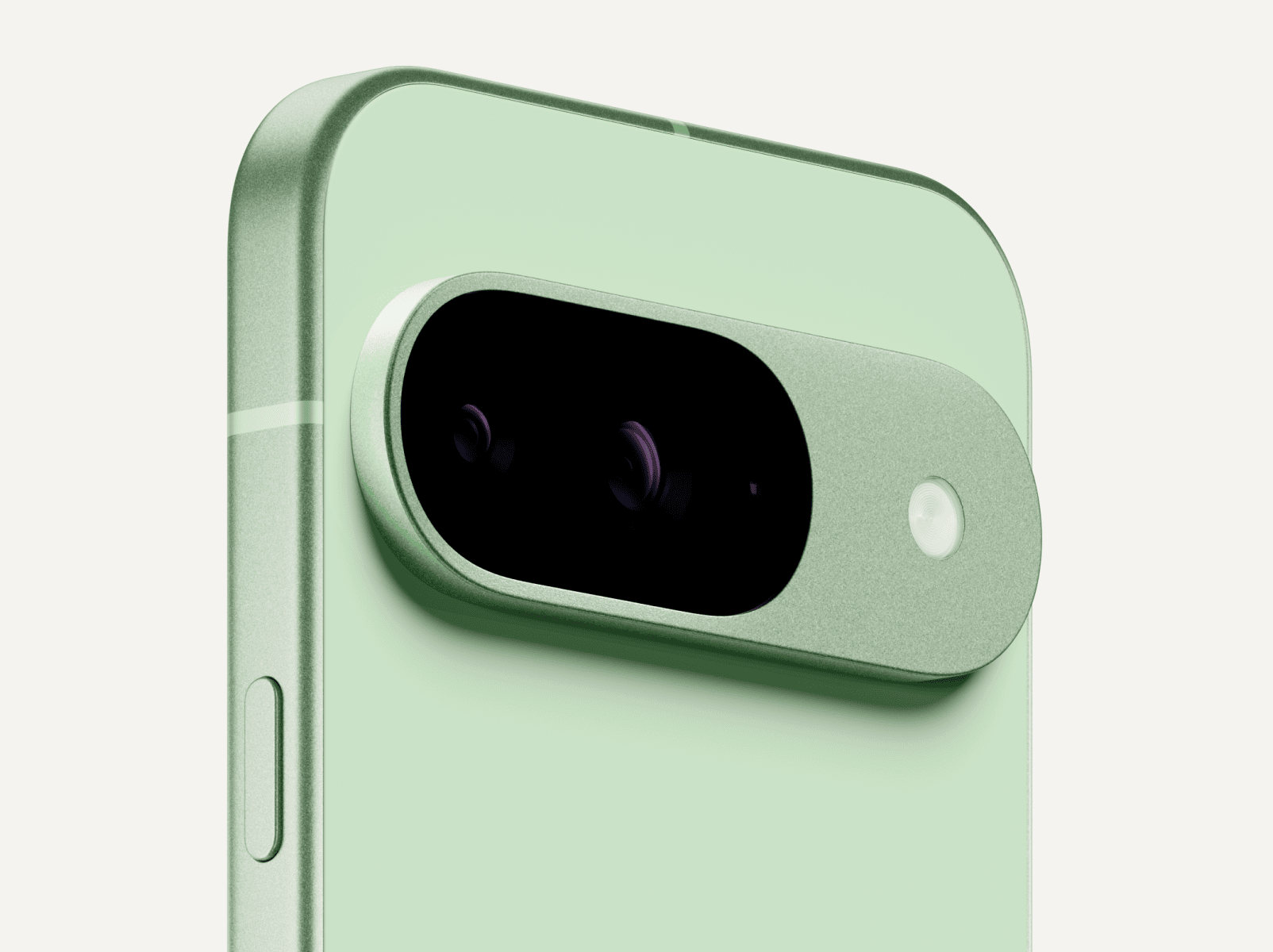 Angled close-up of the back of a Pixel 9 in Wintergreen colour.