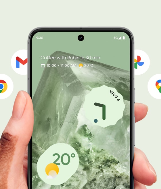 A Pixel phone in front of a carousel of Google app icons.